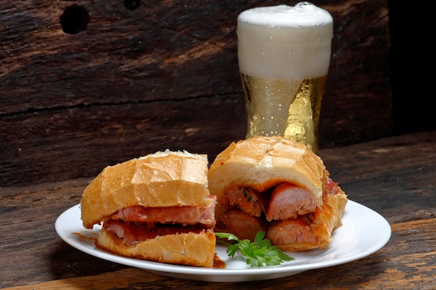 bread with sausage and cold beer