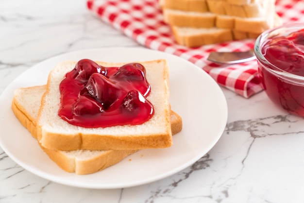 bread with strawberry jam