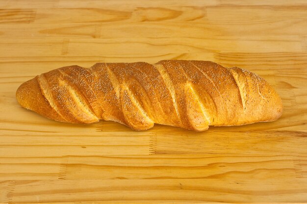 Bread on wooden background