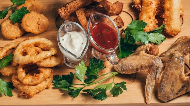 Breaded appetizers and crackers