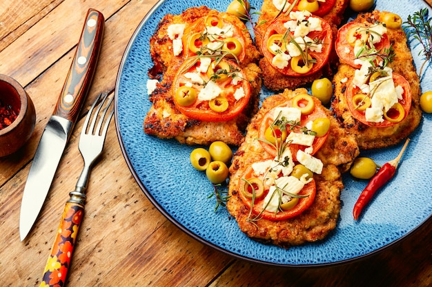 Breaded chicken meat steaks