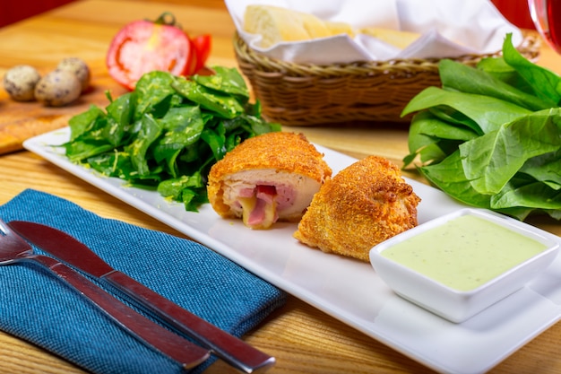 Breaded cutlet served on a plate