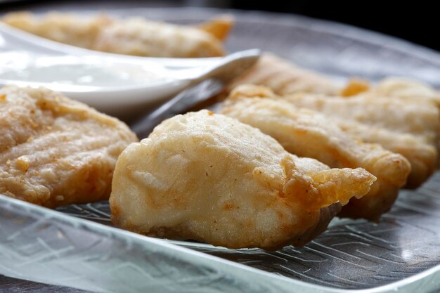 Foto pesce fritto impanato