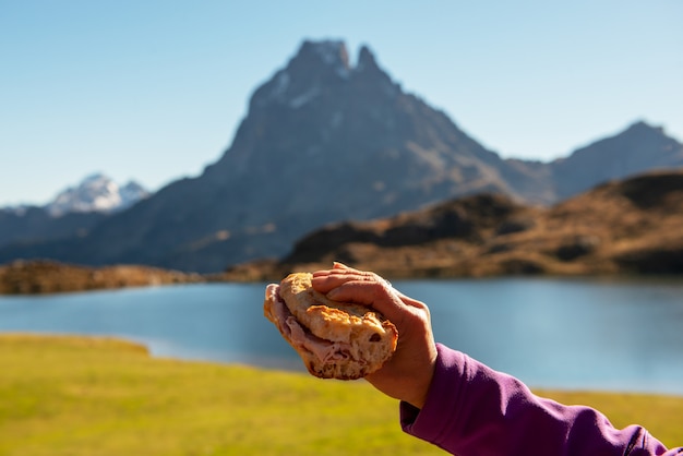 Break crust in the Pyrenees mountain with the Ossau Peak at the bottom