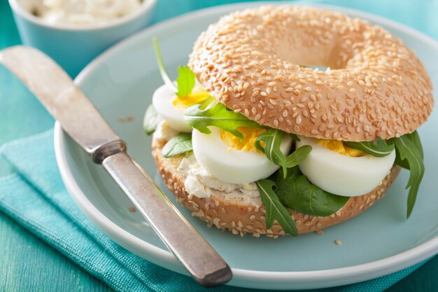 Breakfast Bagel with egg, cream cheese and arugula