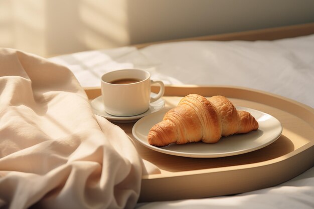 Breakfast in bed coffee and croissants