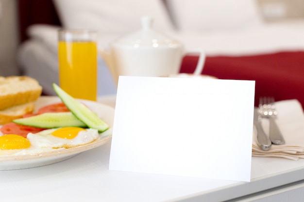 Breakfast in bed in hotel room