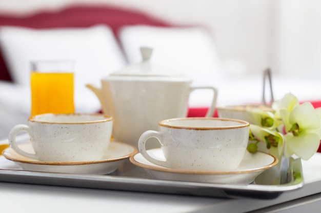 Breakfast in bed in hotel room