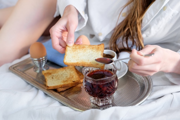 Breakfast in bed in hotel.