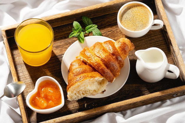 Breakfast in bed on a sunny morning