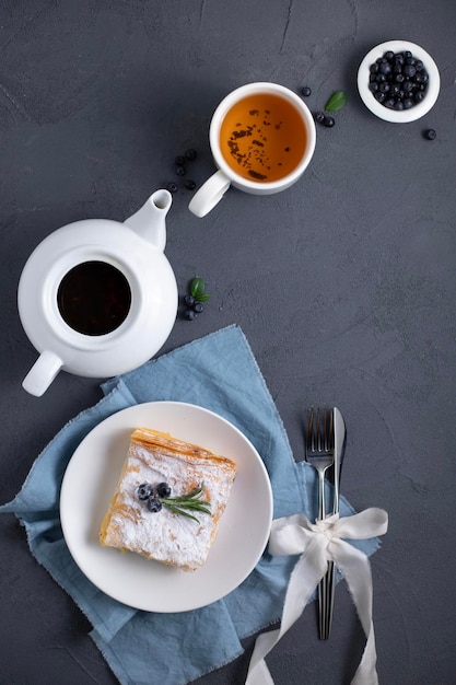 Breakfast of coffee cake and blueberries Flatlay