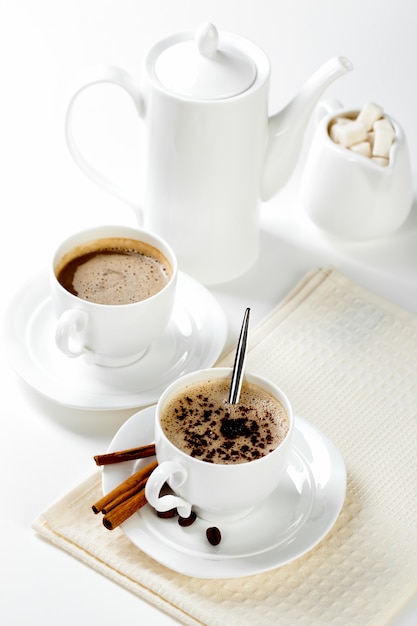 Breakfast.coffee in a cup on a white background