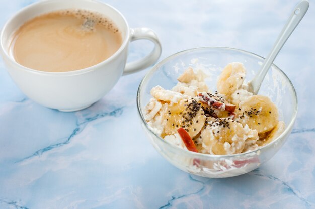 Breakfast, cottage cheese, sour cream, banana and coffee