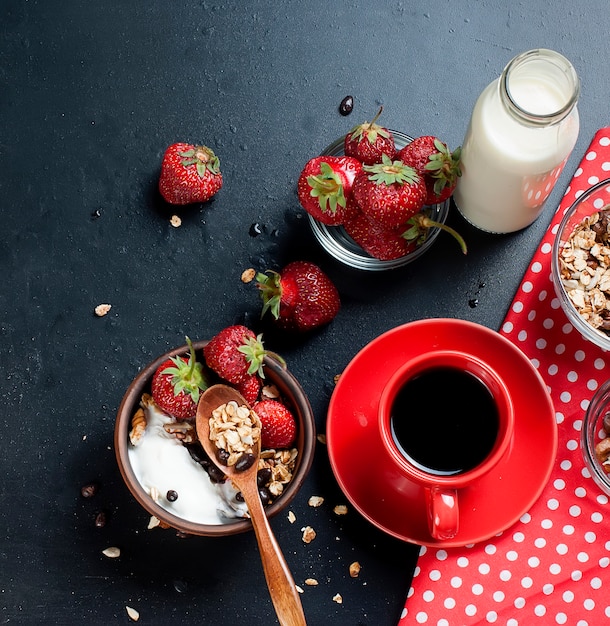 Breakfast granola, a cup of coffee