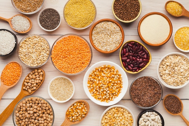 Breakfast meals assortment. Cereals and legumes variety on table, top view