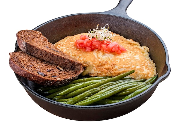 Breakfast in a pan on a white background Scrambled eggs with asparagus and toast