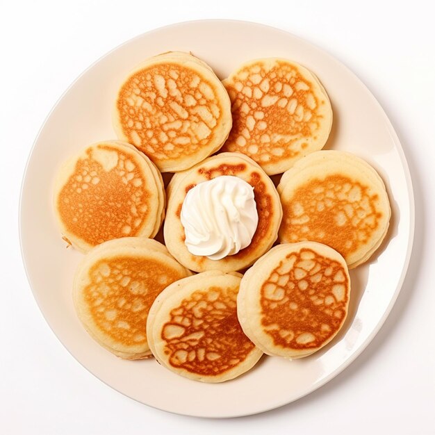 Breakfast pancake on a plate top view with isolated white background