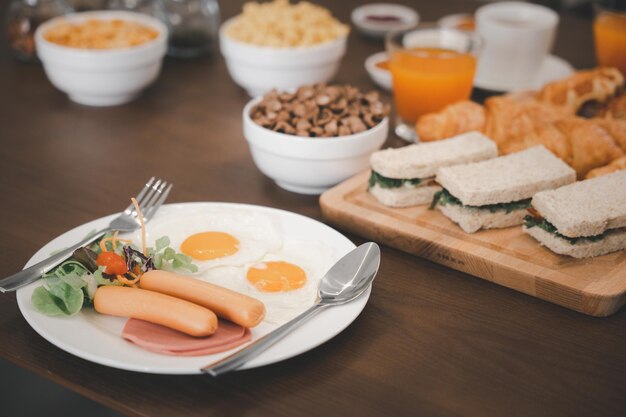 Breakfast served food with beverage coffee, orange juice on table in the morning at home, Fresh and bright continental breakfast healthy