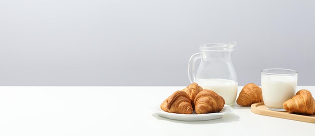 Breakfast tasty food concept milk with bakery products