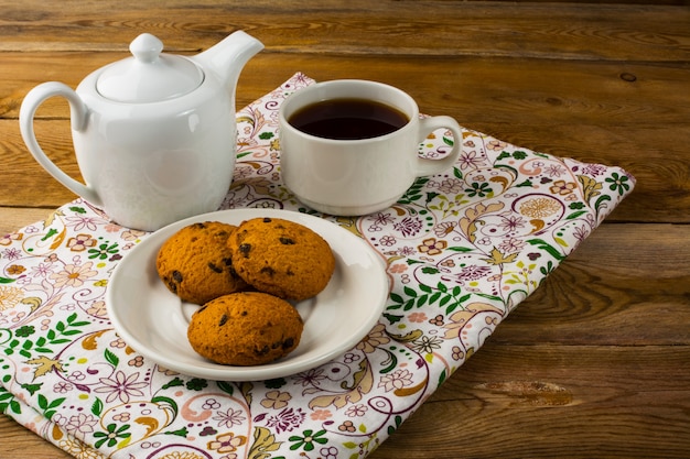 Breakfast tea on wooden background