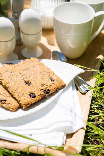 Breakfast for two on the lawn in the garden