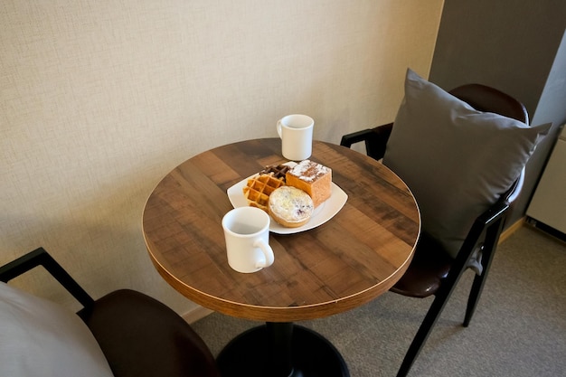 Breakfast waffles and Americano served at Airbnb or European Hawaii hotels