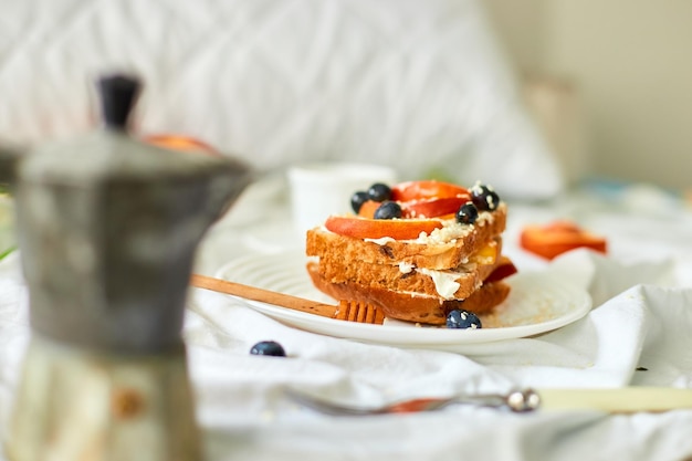 Breakfast on white bed sheets good morning summer french toast