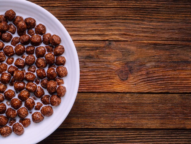 Breakfast with chocolate cereal and milk