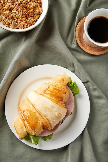 Breakfast with croissant and coffee