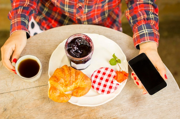 Breakfast with croissants and coffee