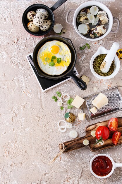 Breakfast with fried quail eggs