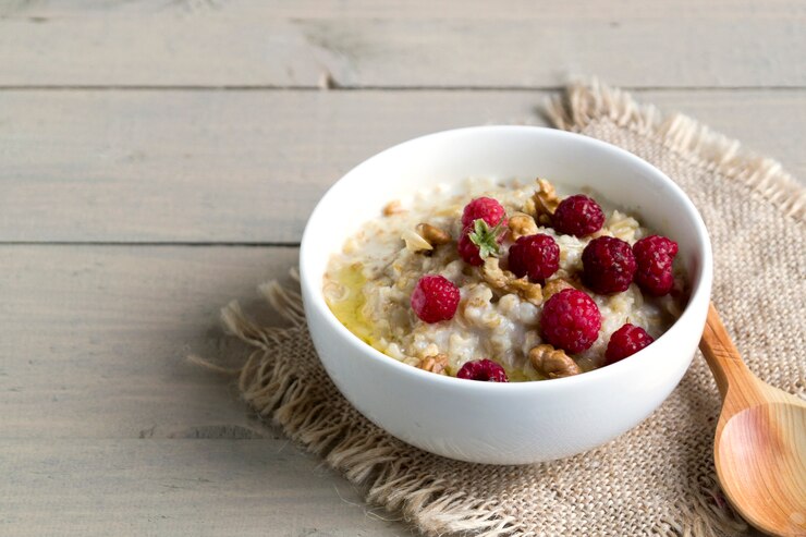 Breakfast with oatmeal and fresh raspberries.