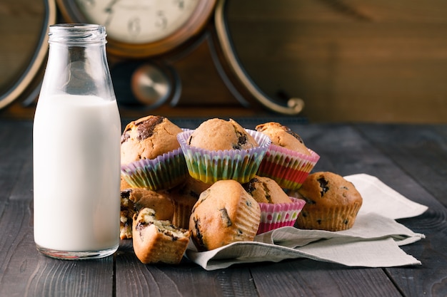 Breakfast with pastry and milk in bottle