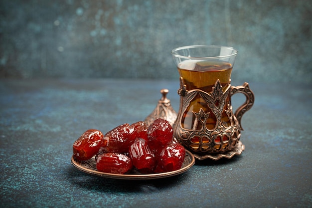 Breaking fasting with dried dates during ramadan kareem