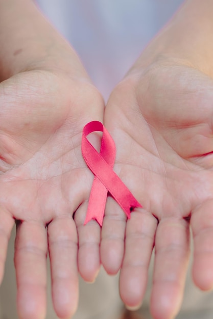 Breast Cancer Awareness Month image Mature White Woman With pink ribbon isolated