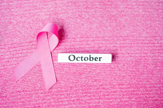 Photo breast cancer awareness month on pink background