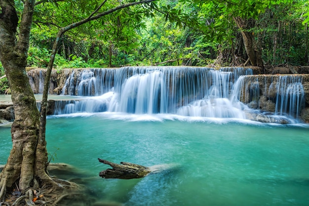 Breathtaking green waterfall at deep forest