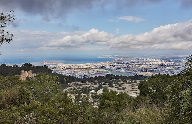 Breathtaking panoramic view of haifa from mount carmel including sea port and residential areas