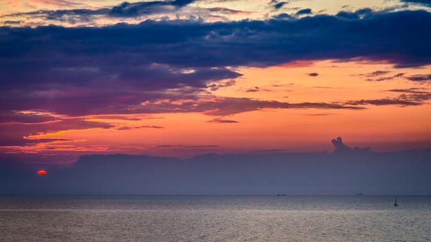 Breathtaking sunset over calm sea in summer