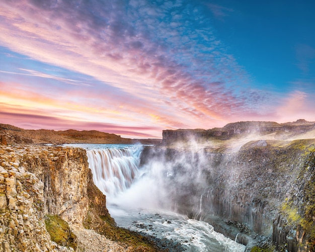 Breathtaking sunset view of the most powerful waterfall in Europe called Dettifoss