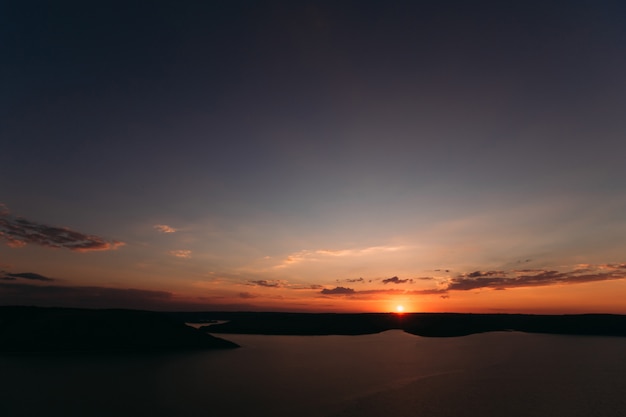 Breathtaking view of sunset on the lake with soft light