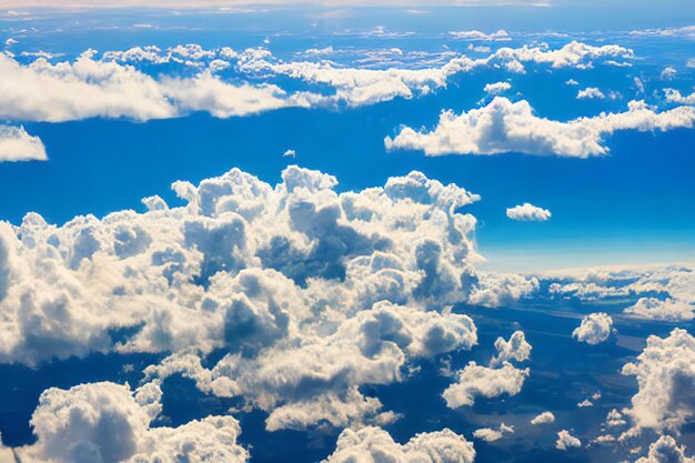 A breathtaking view of white fluffy clouds floating against a vibrant blue sky