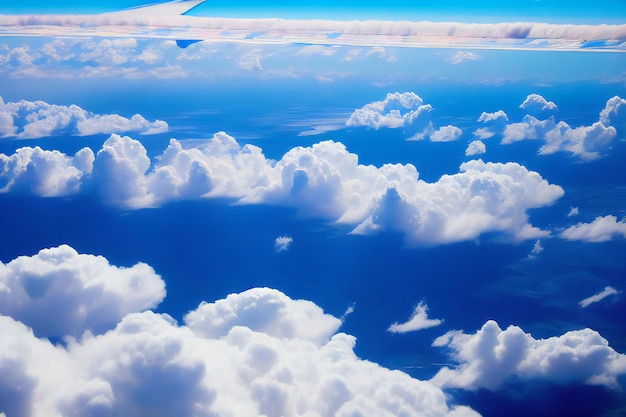 A breathtaking view of white fluffy clouds floating against a vibrant blue sky