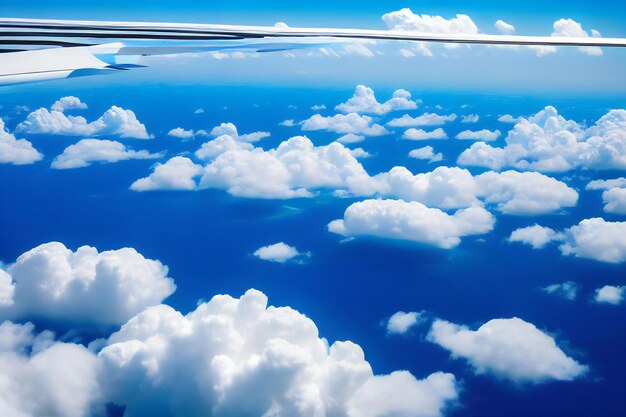 A breathtaking view of white fluffy clouds floating against a vibrant blue sky