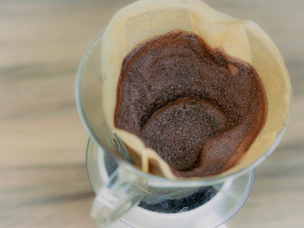 Brewing coffee through a filter in a drip coffee maker