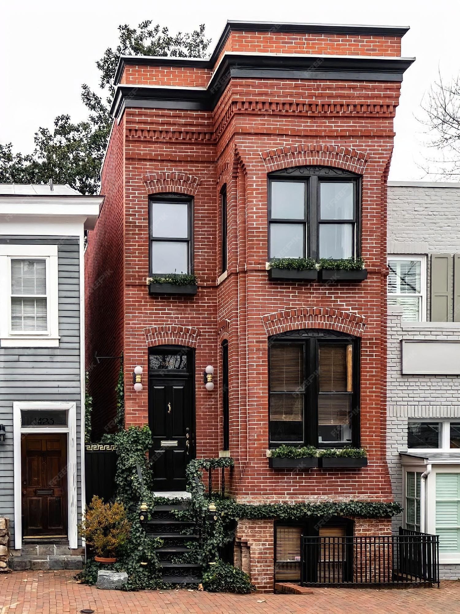 A Row of Brick Buildings with Black Doors on a Street in London Stock Image  - Image of architecture, english: 189002149