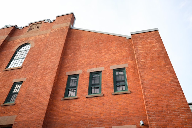 A brick building with windows on the side of it