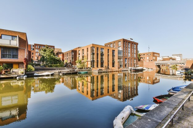 Brick buildings next to a lake