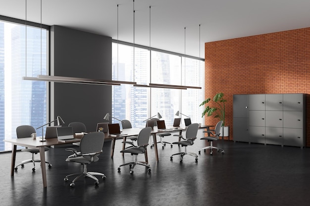 Brick and gray open space office corner