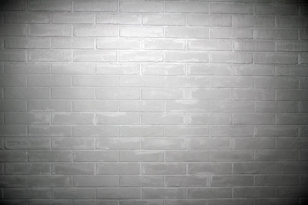 Brick gray wall background light